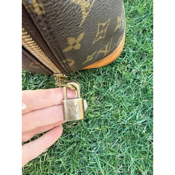 Louis Vuitton Alma Monogram Canvas Handbag Vintage Authentic Lock